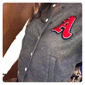 Jacket size small white & grey with Red Letter “A”
